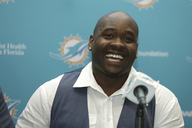Former Mississippi offensive lineman and top Miami Dolphins draft pick Laremy Tunsil, smiles during a news conference, Friday, April 29, 2016 in Davie, Fla. Tunsil was selected 13th overall in the NFL draft Thursday night. (AP Photo/Lynne Sladky)
