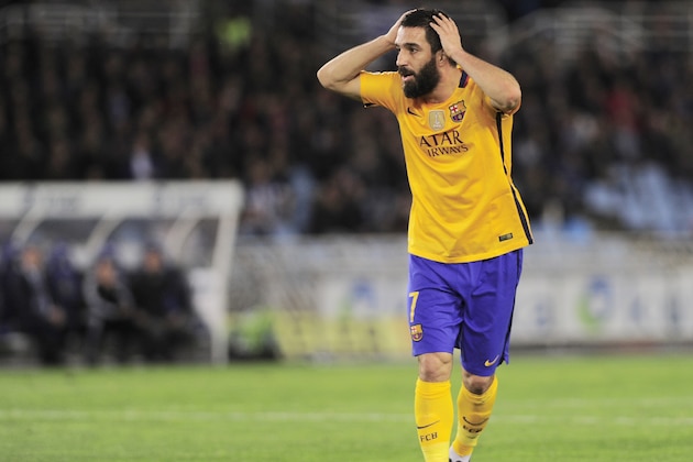 Barcelona's Turkish midfielder Arda Turan gestures during the Spanish league football match Real Sociedad vs FC Barcelona at the Anoeta stadium in San Sebastian on April 9, 2016. / AFP / ANDER GILLENEA        (Photo credit should read ANDER GILLENEA/AFP/Getty Images)
