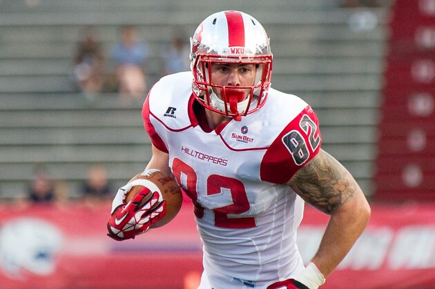 MOBILE, AL - SEPTEMBER 14: Tight end Tyler Higbee #82 of the Western Kentucky Hilltoppers runs downfield during their game against the South Alabama Jaguars on September 14, 2013 at Ladd-Peebles Stadium in Mobile, Alabama. South Alabama defeated Western Kentucky 31-24.  (Photo by Michael Chang/Getty Images)
