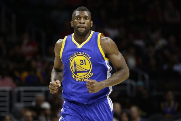 Golden State Warriors center Festus Ezeli makes his way down the court during the first half of an NBA preseason basketball game against the Los Angeles Clippers, Tuesday, Oct. 20, 2015, in Los Angeles. (AP Photo/Jae C. Hong)