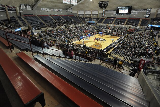 Empty seats are seen in Harry A. Gampel Pavilion at the University of Connecticut during the second half of a women's college basketball game between Connecticut and Rutgers in the second round of the NCAA tournament, Monday, March 23, 2015, in Storrs, Conn. Buoyed by a move back to host sites and more weekend games, overall attendance rose at the women's NCAA Tournament in the opening two rounds. Still some arenas had more empty seats then fans, a problem caused by late start times. (AP Photo/Jessica Hill)