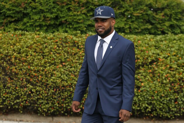 The Dallas Cowboys' first-round NFL football draft pick, Ezekiel Elliott, arrives at Valley Ranch, the team's headquarters and training facility, Friday, April 29, 2016, in Irving, Texas. (AP Photo/Tony Gutierrez)