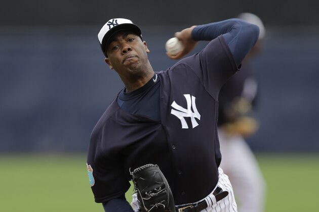New York Yankees relief pitcher Aroldis Chapman warms up during a spring training baseball game against the Atlanta Braves Saturday, March 19, 2016, in Tampa, Fla. (AP Photo/Chris O'Meara)