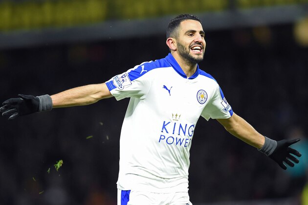 Leicester City's Algerian midfielder Riyad Mahrez celebrates scoring his team's first goal during the English Premier League football match between Watford and Leicester City at Vicarage Road Stadium in Watford, north of London on March 5, 2016. / AFP / OLLY GREENWOOD / RESTRICTED TO EDITORIAL USE. No use with unauthorized audio, video, data, fixture lists, club/league logos or 'live' services. Online in-match use limited to 75 images, no video emulation. No use in betting, games or single club/league/player publications.  /         (Photo credit should read OLLY GREENWOOD/AFP/Getty Images)