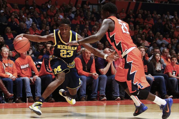 CHAMPAIGN, IL - DECEMBER 30: Caris LeVert #23 of the Michigan Wolverines drives to the basket during the game against the Illinois Fighting Illini at State Farm Center on December 30, 2015 in Champaign, Illinois.  (Photo by Michael Hickey/Getty Images)