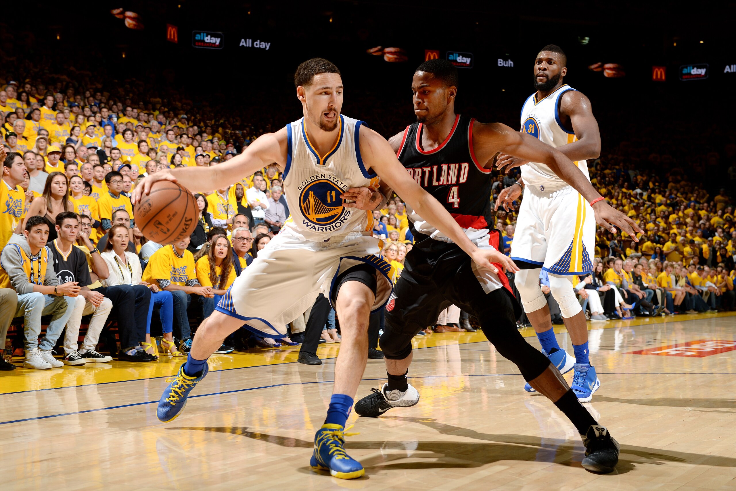 OAKLAND, CA - MAY 3: Klay Thompson #11 of the Golden State Warriors handles the ball during the game against Maurice Harkless #4 of the Portland Trail Blazers in Game Two of the Western Conference Semifinals during the 2016 NBA Playoffs on May 3, 2016 at ORACLE Arena in Oakland, California. NOTE TO USER: User expressly acknowledges and agrees that, by downloading and or using this photograph, user is consenting to the terms and conditions of Getty Images License Agreement. Mandatory Copyright Notice: Copyright 2016 NBAE (Photo by Garrett Ellwood/NBAE via Getty Images)