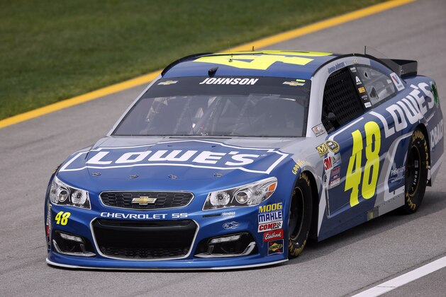 NASCAR driver Jimmie Johnson (48) during the qualifying for Sunday's NASCAR auto race at Talladega Superspeedway, Saturday, April 30, 2016, in Talladega, Ala. (AP Photo/John Bazemore)