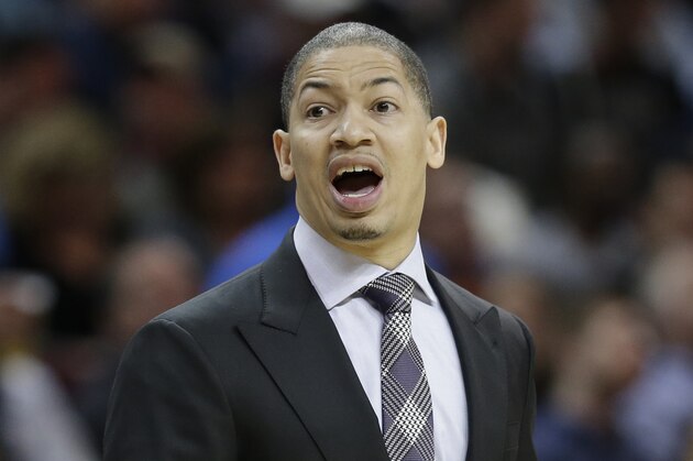 Cleveland Cavaliers head coach Tyronn Lue yells to players in the first half of an NBA basketball game against the Atlanta Hawks, Monday, April 11, 2016, in Cleveland. The Cavaliers won 109-94. (AP Photo/Tony Dejak)