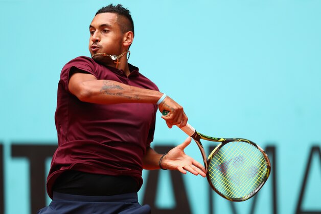 MADRID, SPAIN - MAY 05:  Nick Kyrgios of Australia in action against Pablo Cuevas of Uruguay during day six of the Mutua Madrid Open tennis tournament at the Caja Magica on May 05, 2016 in Madrid, Spain.  (Photo by Julian Finney/Getty Images)