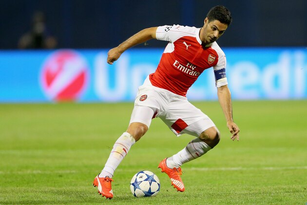ZAGREB, CROATIA - SEPTEMBER 16:  Mikel Arteta of Londons runs with the ball during the UEFA Champions League Group F match between Dinamo Zagreb and Arsenal at Maksimir Stadium on September 16, 2015 in Zagreb, Croatia.  (Photo by Alexander Hassenstein/Getty Images)