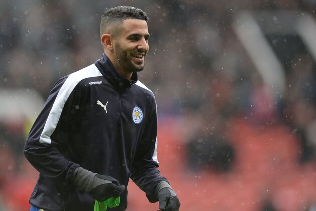 Leicester City's Algerian midfielder Riyad Mahrez warms up before the English Premier League football match between Manchester United and Leicester City at Old Trafford in Manchester, north west England, on May 1, 2016. / AFP / OLI SCARFF / RESTRICTED TO EDITORIAL USE. No use with unauthorized audio, video, data, fixture lists, club/league logos or 'live' services. Online in-match use limited to 75 images, no video emulation. No use in betting, games or single club/league/player publications.  /         (Photo credit should read OLI SCARFF/AFP/Getty Images)