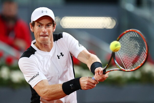 MADRID, SPAIN - MAY 06:  Andy Murray of Great Britain hits a backhand during the Men's Singles Quarter Final match against Tomas Berdych of the Czech Republic during day seven of the Mutua Madrid Open at La Caja Magica on May 6, 2016 in Madrid, Spain.  (Photo by Julian Finney/Getty Images)