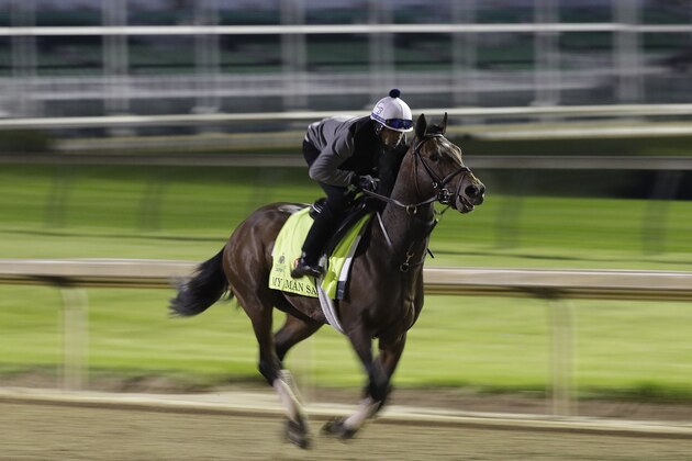 Exercise rider Daniel Bernardini takes Kentucky Derby entrant My Man Sam for a workout at Churchill Downs Friday, May 6, 2016, in Louisville, Ky. The 142nd running of the Kentucky Derby is scheduled for Saturday, May 7. (AP Photo/Charlie Riedel)