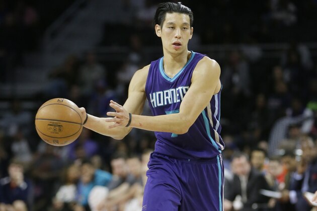 Charlotte Hornets guard Jeremy Lin brings the ball up court during the second half of an NBA basketball game against the Detroit Pistons, Friday, March 25, 2016, in Auburn Hills, Mich. (AP Photo/Carlos Osorio)