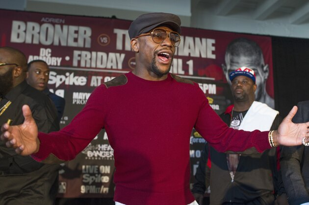 Retired professional boxer, promoter Floyd Mayweather, center, appears with boxer Ashley Theophane, right, and rapper Rick Ross, left, to promote an April 1, 2016, fight between Theophane and Adrien Broner, Monday, Feb. 29, 2016, in Washington. (AP Photo/Cliff Owen) Retired professional boxer, promoter Floyd Mayweather, center, appears with boxer Ashley Theophane, right, and rapper Rick Ross, left, to promote an April 1, 2016, fight between Theophane and Adrien Broner, Monday, Feb. 29, 2016, in Washington. (AP Photo/Cliff Owen)
