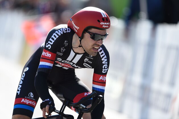 Netherlands' Tom Dumoulin of the TGA team takes second place of the fourth stage of the 70th Tour de Romandie UCI World Tour cycling race, a 15 km individual time-trial, in Sion on April 29, 2016, in Lausanne. / AFP / Alain Grosclaude        (Photo credit should read ALAIN GROSCLAUDE/AFP/Getty Images)