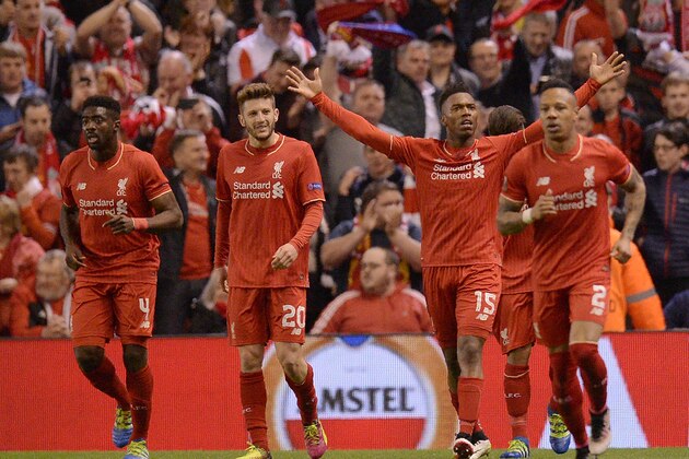 Liverpool's English striker Daniel Sturridge (2nd R) celebrates scoring his team's second goal during the UEFA Europa League semi-final second leg football match between Liverpool and Villarreal CF at Anfield in Liverpool, northwest England on May 5, 2016. / AFP / OLI SCARFF        (Photo credit should read OLI SCARFF/AFP/Getty Images)