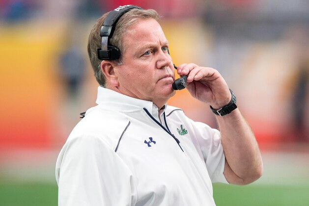 Jan 1, 2016; Glendale, AZ, USA; Notre Dame Fighting Irish head coach Brian Kelly watches from the sideline against the Ohio State Buckeyes in the 2016 Fiesta Bowl at University of Phoenix Stadium. Mandatory Credit: Matt Cashore-USA TODAY Sports