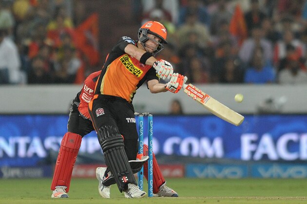 Sunrisers Hyderabad captain David Warner plays a shot during the 2016 Indian Premier League (IPL) Twenty20 cricket match between Sunrisers Hyderabad and Royal Challengers Bangalore at The Rajiv Gandhi International Stadium in Hyderabad  on April 30, 2016.  / AFP / NOAH SEELAM        (Photo credit should read NOAH SEELAM/AFP/Getty Images)