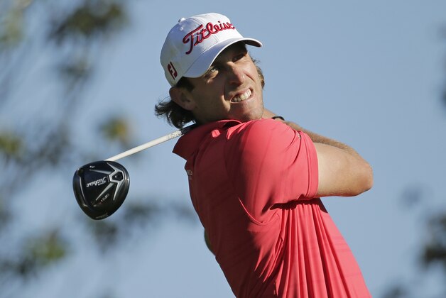 Andrew Loupe watches his tee shot on the 16th hole during the second round of the Wells Fargo Championship golf tournament at Quail Hollow Club in Charlotte, N.C., Friday, May 6, 2016. (AP Photo/Chuck Burton)