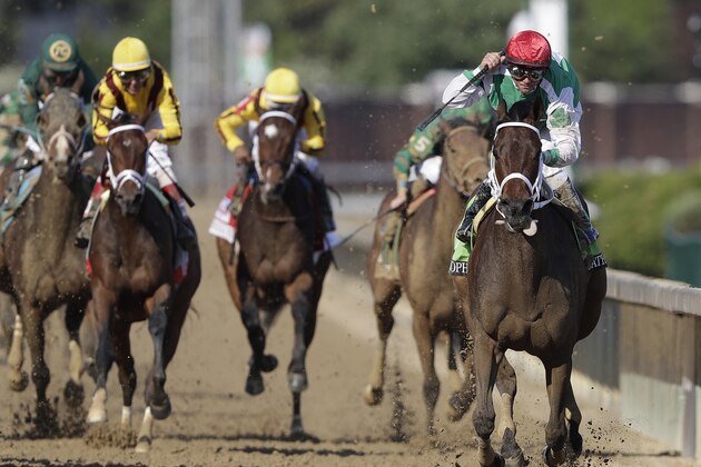 Javier Castellano rides Cathryn Sophia to victory in the 142nd running of the Kentucky Oaks horse race at Churchill Downs Friday, May 6, 2016, in Louisville, Ky. (AP Photo/Darron Cummings)