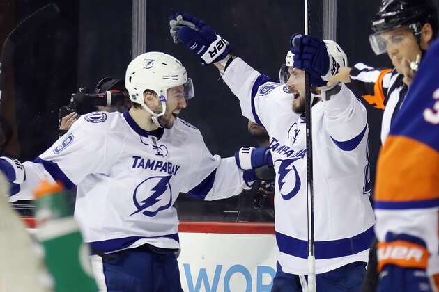 NEW YORK, NY - MAY 06:  Nikita Kucherov #86 of the Tampa Bay Lightning (r) celebrates his game tying goal at 7:49 of the third period against the New York Islanders and is joined by Tyler Johnson #9 (l) in Game Four of the Eastern Conference Second Round during the 2016 NHL Stanley Cup Playoffs at the Barclays Center on May 06, 2016 in the Brooklyn borough of New York City.  (Photo by Bruce Bennett/Getty Images)