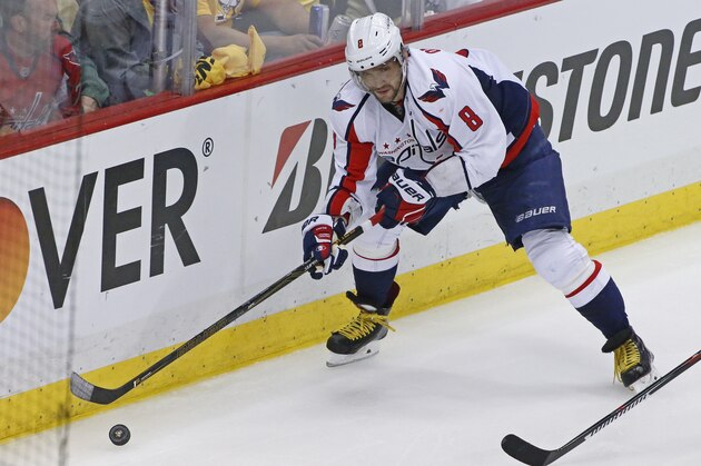 Washington Capitals Alex Ovechkin (8) carries the puck during the third period of Game 3 against the Pittsburgh Penguins in an NHL hockey Stanley Cup Eastern Conference semifinals in Pittsburgh, Monday, May 2, 2016. (AP Photo/Gene J. Puskar)