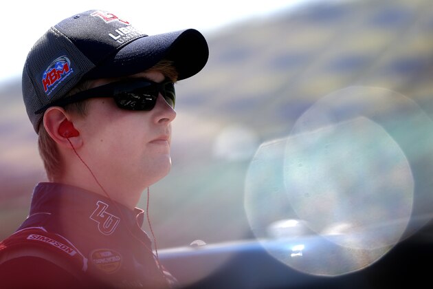 KANSAS CITY, KS - MAY 06:  William Byron, driver of the #9 Liberty University Toyota, looks on during qualifying for the NASCAR Camping World Truck Series Toyota Tundra 250 at Kansas Speedway on May 6, 2016 in Kansas City, Kansas.  (Photo by Brian Lawdermilk/Getty Images)