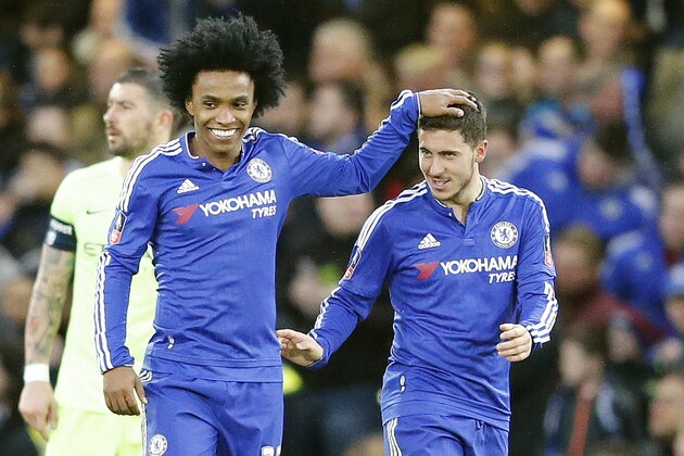 Chelsea's Willian, left, and teammate Eden Hazard celebrate after scoring during the English FA Cup soccer match between Chelsea and Manchester City at the Stamford Bridge stadium in London, Sunday, Feb. 21, 2016.(AP Photo/Frank Augstein)