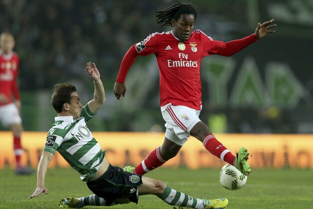 Benfica's Renato Sanches, right, vies for the ball with Sporting’s Joao Pereira during their Portuguese league soccer match at the Alvalade Stadium in Lisbon, Saturday, March 5, 2016. Benfica won 1-0 and is now the League leader. (AP Photo/Steven Governo) Benfica's Renato Sanches, right, vies for the ball with Sporting’s Joao Pereira during their Portuguese league soccer match at the Alvalade Stadium in Lisbon, Saturday, March 5, 2016. Benfica won 1-0 and is now the League leader. (AP Photo/Steven Governo)