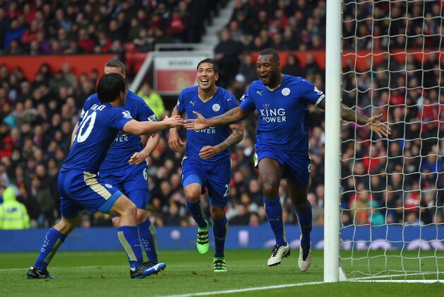 MANCHESTER, ENGLAND - MAY 01:  Wes Morgan of Leicester City celebrates scoring his team's opening goal with team mates during the Barclays Premier League match between Manchester United and Leicester City at Old Trafford on May 1, 2016 in Manchester, England.  (Photo by Michael Regan/Getty Images)