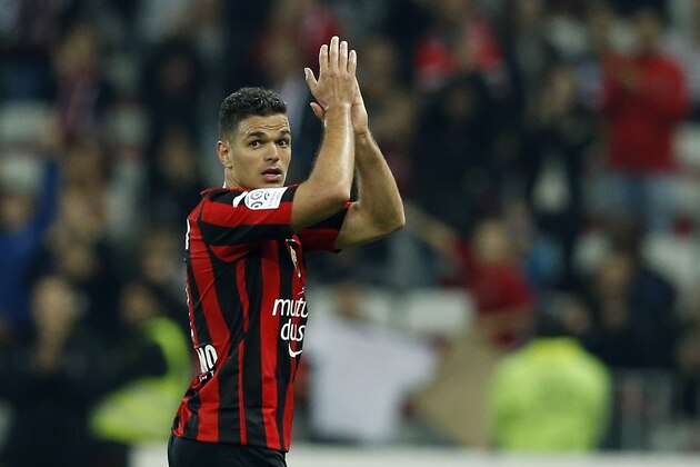 Nice's French forward Hatem Ben Arfa acknowledges applause from supporters as he leaves the pitch following the French L1 football match Nice vs Reims on April 22, 2016 at the 'Allianz Riviera' stadium in Nice, southeastern France.  AFP PHOTO / VALERY HACHE / AFP / VALERY HACHE        (Photo credit should read VALERY HACHE/AFP/Getty Images)