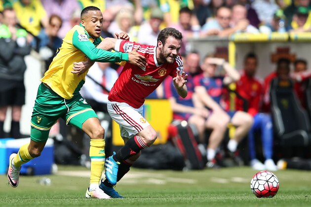 Norwich City's Swedish defender Martin Olsson (L) vies with Manchester United's Spanish midfielder Juan Mata during the English Premier League football match between Norwich City and Manchester United at Carrow Road in Norwich, eastern England, on May 7, 2016.

 / AFP / JUSTIN TALLIS        (Photo credit should read JUSTIN TALLIS/AFP/Getty Images)
