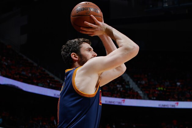 ATLANTA, GA - MAY 06:  Kevin Love #0 of the Cleveland Cavaliers shoots a three-point basket against the Atlanta Hawks in Game Three of the Eastern Conference Semifinals during the 2016 NBA Playoffs at Philips Arena on May 6, 2016 in Atlanta, Georgia.  NOTE TO USER User expressly acknowledges and agrees that, by downloading and or using this photograph, user is consenting to the terms and conditions of the Getty Images License Agreement.  (Photo by Kevin C. Cox/Getty Images)