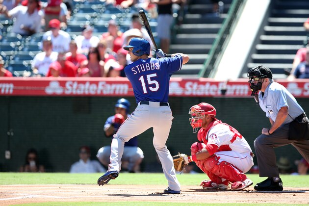 ANAHEIM, CA - SEPTEMBER 6:  Drew Stubbs #15 of the Texas Rangers bats during the game against the Los Angeles Angels of Anaheim at Angel Stadium on September 6, 2015 in Anaheim, California.  The Angels defeated the Rangers 7-0.  (Photo by Rob Leiter/MLB Photos via Getty Images)
