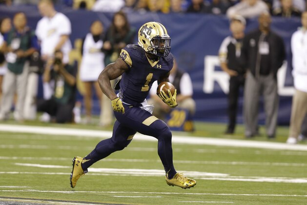 Notre Dame running back Greg Bryant  runs against Purdue during the first half of an NCAA college football game in Indianapolis, Saturday, Sept. 13, 2014. (AP Photo/Michael Conroy)