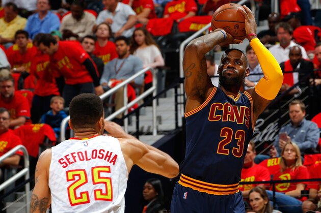 ATLANTA, GA - MAY 06:  LeBron James #23 of the Cleveland Cavaliers shoots against Thabo Sefolosha #25 of the Atlanta Hawks in Game Three of the Eastern Conference Semifinals during the 2016 NBA Playoffs at Philips Arena on May 6, 2016 in Atlanta, Georgia.  NOTE TO USER User expressly acknowledges and agrees that, by downloading and or using this photograph, user is consenting to the terms and conditions of the Getty Images License Agreement.  (Photo by Kevin C. Cox/Getty Images)