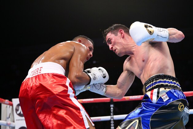 MANCHESTER, ENGLAND - MAY 07:  Anthony Crolla lands a right shot on Ismael Barroso during the WBA World Lightweight Championship fight between Anthony Crolla and Ismael Barroso at Manchester Arena on May 07, 2016 in Manchester, England.  (Photo by Alex Livesey/Getty Images)