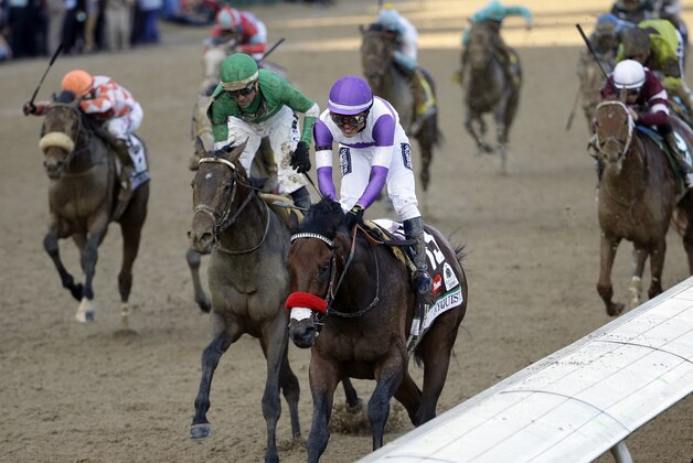 Mario Guitierrez rides Nyquist to victory during the 142nd running of the Kentucky Derby horse race at Churchill Downs Saturday, May 7, 2016, in Louisville, Ky. (AP Photo/David J. Phillip)