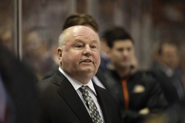 FILE - In this April 8, 2015 file photo,  Anaheim Ducks head coach Bruce Boudreau coaches his team during the first period of an NHL hockey game against the Dallas Stars, in Anaheim, Calif. The Anaheim Ducks have fired coach Bruce Boudreau after their first-round exit from the playoffs. Ducks general manager Bob Murray announced the decision Friday, April 29, 2016. (AP Photo/Jae C. Hong, File)