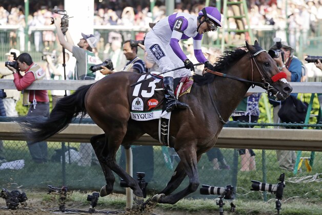 Mario Gutierrez celebrates after riding Nyquist to victory during the 142nd running of the Kentucky Derby horse race at Churchill Downs Saturday, May 7, 2016, in Louisville, Ky. (AP Photo/Garry Jones) Mario Gutierrez celebrates after riding Nyquist to victory during the 142nd running of the Kentucky Derby horse race at Churchill Downs Saturday, May 7, 2016, in Louisville, Ky. (AP Photo/Garry Jones)