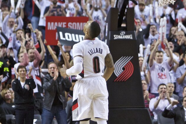 FILE - In this April 25, 2016, file photo, Portland Trail Blazers guard Damian Lillard reacts after making a three-point basket during the second half of Game 4 of an NBA basketball first-round playoff series against the Los Angeles Clippers, in Portland, Ore. The start of Damian Lillard's playoff series against Golden State has been rough. As Lillard goes, often so do the Trail Blazers. Portland is down 2-0, but Lillard seems to perform best when tested.  (AP Photo/Craig Mitchelldyer, File)