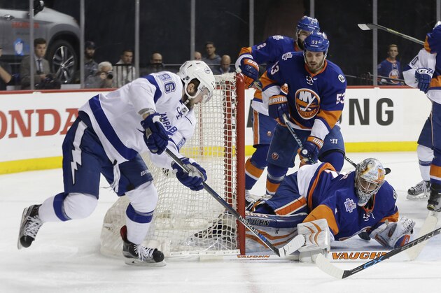 New York Islanders goalie Thomas Greiss (1) blocks a shot by Tampa Bay Lightning right wing Nikita Kucherov (86) during the first period of Game 4 of the NHL hockey Stanley Cup Eastern Conference semifinals, Friday, May 6, 2016, in New York. (AP Photo/Frank Franklin II)