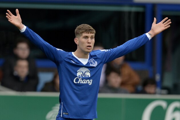 Everton's English defender John Stones gestures during the English Premier League football match between Everton and Arsenal at Goodison Park in Liverpool, north west England on March 19, 2016. / AFP / OLI SCARFF / RESTRICTED TO EDITORIAL USE. No use with unauthorized audio, video, data, fixture lists, club/league logos or 'live' services. Online in-match use limited to 75 images, no video emulation. No use in betting, games or single club/league/player publications.  /         (Photo credit should read OLI SCARFF/AFP/Getty Images)