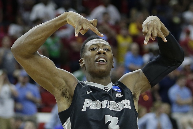 Providence guard Kris Dunn celebrates after the second half of a first-round men's college basketball game in the NCAA Tournament against Southern California, Friday, March 18, 2016, in Raleigh, N.C.  Providence won 70-69. (AP Photo/Chuck Burton)