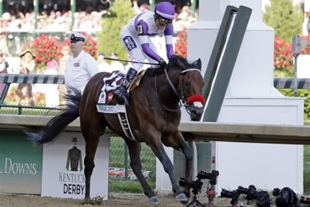 CORRECTS LAST NAME TO GUTIERREZ FROM GUITIERREZ - Mario Gutierrez celebrates after riding Nyquist to victory during the 142nd running of the Kentucky Derby horse race at Churchill Downs Saturday, May 7, 2016, in Louisville, Ky. (AP Photo/Garry Jones)