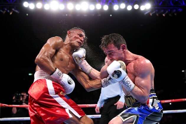 MANCHESTER, ENGLAND - MAY 07: Anthony Crolla lands a right shot on Ismael Barroso during the WBA World Lightweight Championship fight between Anthony Crolla and Ismael Barroso at Manchester Arena on May 07, 2016 in Manchester, England. (Photo by Alex Livesey/Getty Images) MANCHESTER, ENGLAND - MAY 07: Anthony Crolla lands a right shot on Ismael Barroso during the WBA World Lightweight Championship fight between Anthony Crolla and Ismael Barroso at Manchester Arena on May 07, 2016 in Manchester, England. (Photo by Alex Livesey/Getty Images)
