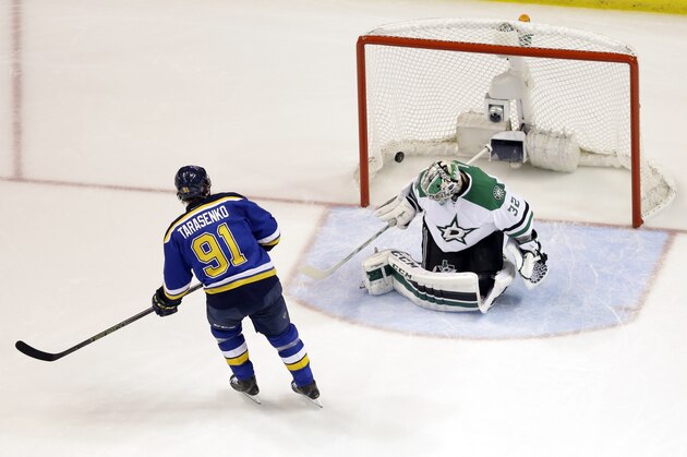 St. Louis Blues right wing Vladimir Tarasenko, left, of Russia, scores past Dallas Stars goalie Kari Lehtonen, of Finland, during the first period of Game 4 of the NHL hockey Stanley Cup Western Conference semifinals, Thursday, May 5, 2016, in St. Louis. (AP Photo/Jeff Roberson)