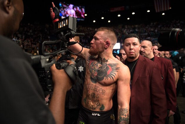 LAS VEGAS, NV - MARCH 5:   Conor McGregor exits the Octagon after his submission loss to Nate Diaz in their welterweight bout during the UFC 196 in the MGM Grand Garden Arena on March 5, 2016 in Las Vegas, Nevada. (Photo by Brandon Magnus/Zuffa LLC/Zuffa LLC via Getty Images)