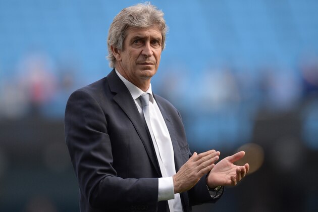 Manchester City's Chilean manager Manuel Pellegrini applauds the fans after the English Premier League football match between Manchester City and Arsenal at the Etihad Stadium in Manchester, north west England, on May 8, 2016. / AFP / OLI SCARFF / RESTRICTED TO EDITORIAL USE. No use with unauthorized audio, video, data, fixture lists, club/league logos or 'live' services. Online in-match use limited to 75 images, no video emulation. No use in betting, games or single club/league/player publications.  /         (Photo credit should read OLI SCARFF/AFP/Getty Images)